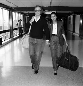 Actor Michael Caine and his wife Shakira arriving at Heathrow Airport from Barbados Actor Michael Caine and his wife Shakira arriving at Heathrow Airport from Barbados