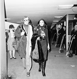 Images Dated 14th April 1975: Actor Michael Caine and wife Shakira seen here at Heathrow Airport. April 1975 75-1940