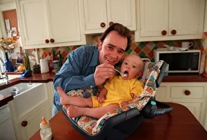 Actor Todd Carty at home with baby son James, June 1997 Actor Todd Carty at home with baby son James, June 1997