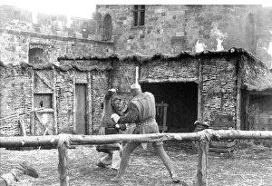 Actors and stunt men fighting hand-to-hand combat in Alnwick Castle in 1981 Actors and stunt men fighting hand-to-hand combat in Alnwick Castle in 1981