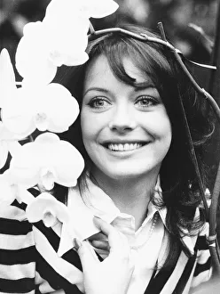 Actress Lesley Anne Down with orchid named after her when she opened the British Orchid Actress Lesley Anne Down with orchid named after her when she opened the British Orchid