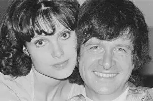 Images Dated 10th August 1975: Actress Madeline Smith pictured at home with her boyfriend film actor David Buck