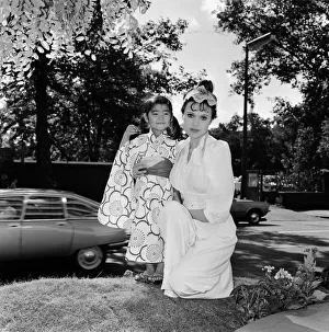 Actress Madeline Smith with three year old Kana Chiba from Japan at the Summer party of Actress Madeline Smith with three year old Kana Chiba from Japan at the Summer party of