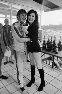 Actress and former model Madeline Smith presents a trophy Actress and former model Madeline Smith presents a trophy