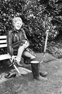 Images Dated 12th November 1977: Actress Molly Sugden at home in her garden. 12th November 1977