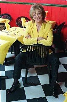 Actress Sherrie Hewson in her restaurant Booms in Richmond, sitting on a chair Actress Sherrie Hewson in her restaurant Booms in Richmond, sitting on a chair