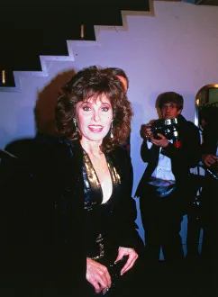 Actress Stephanie Powers February 1989 wearing low cut navy and gold dress Actress Stephanie Powers February 1989 wearing low cut navy and gold dress