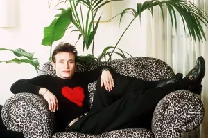 Adam Ant singer sits in chair - Stuart Goddard Adam Ant singer sits in chair - Stuart Goddard