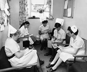 Addenbrooke's Hospital Nursing Staff prepare for a new day on the wards, Cambridge Addenbrooke's Hospital Nursing Staff prepare for a new day on the wards, Cambridge