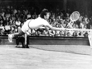 Adriano Panatta Tennis Player diving on court Aug 1976 to score a winning point against Adriano Panatta Tennis Player diving on court Aug 1976 to score a winning point against