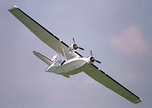 Aircraft Consolidated PYB Catalina Amphibian aircraft Aug 1993 flying at Aircraft Consolidated PYB Catalina Amphibian aircraft Aug 1993 flying at