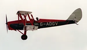 Aircraft deHavilland DH82 Tiger Moth August 1993, flying at the Wroughton Airshow Aircraft deHavilland DH82 Tiger Moth August 1993, flying at the Wroughton Airshow
