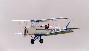 Aircraft de Havilland DH82 Tiger Moth August 1993 flying at the Wroughton Aircraft de Havilland DH82 Tiger Moth August 1993 flying at the Wroughton