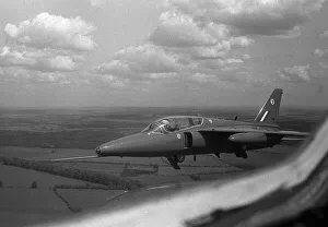 Aircraft The Red Arrows Hawker Siddeley Gnat T1 in close formation starts to lower its Aircraft The Red Arrows Hawker Siddeley Gnat T1 in close formation starts to lower its