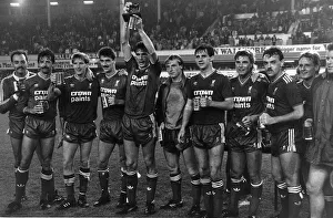 Alan Hansen of Liverpool with Screen Sport Super Cup 1986 Alan Hansen of Liverpool with Screen Sport Super Cup 1986