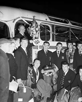 Alan Prescott holds the Rugby League Cup aloft as the St Helens team arrive at the Town Alan Prescott holds the Rugby League Cup aloft as the St Helens team arrive at the Town
