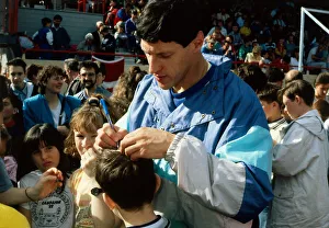 Alan Wells signing autograph on childs head November 1988 Alan Wells signing autograph on childs head November 1988