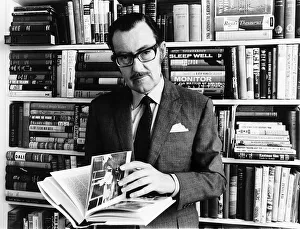 Alan Whicker TV presenter in his library in his flat May 1968 in Regents Park Alan Whicker TV presenter in his library in his flat May 1968 in Regents Park