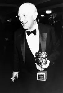 Alec Guinness actor holding BAFTA award in March 1989 Alec Guinness actor holding BAFTA award in March 1989