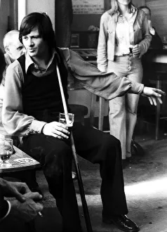 Alex Higgins snooker drinking and holding cue Apr 73 Alex Higgins snooker drinking and holding cue Apr 73