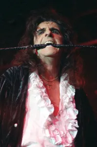 Alice Cooper pop singer with whip in his mouth on stage at Barrowlands Glasgow Alice Cooper pop singer with whip in his mouth on stage at Barrowlands Glasgow