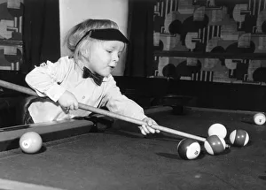 Allan Palmer Pool The hustler Allan Palmer aged 2 reaches across the table with his Allan Palmer Pool The hustler Allan Palmer aged 2 reaches across the table with his