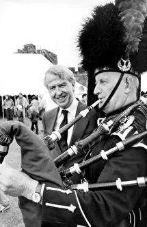 Alnwick Piper Jimmy Jones talks with Mr. Peter Walker after piping him in to open a Alnwick Piper Jimmy Jones talks with Mr. Peter Walker after piping him in to open a