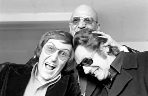 American actor Telly Savalas with Yin (left) and Yan, two pop singers who have made a American actor Telly Savalas with Yin (left) and Yan, two pop singers who have made a