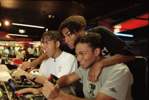 American boy band 3T playing video games at an Arcade 9th September 1996 American boy band 3T playing video games at an Arcade 9th September 1996
