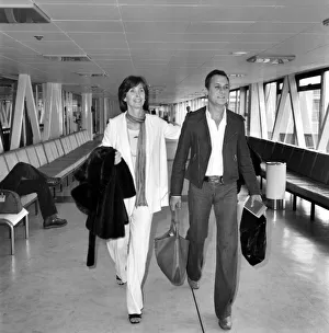 American film actor Tony Curtis and wife Lesley at Heathrow airport American film actor Tony Curtis and wife Lesley at Heathrow airport