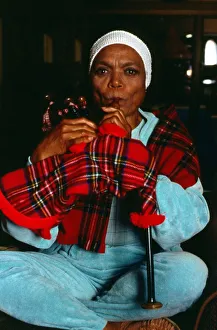 American singer and actress Eartha Kitt blowing into bagpipes November 1989 American singer and actress Eartha Kitt blowing into bagpipes November 1989