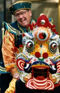 Andy Cameron comedian in traditional Chinese costume dragon mask star of The Adventures Andy Cameron comedian in traditional Chinese costume dragon mask star of The Adventures