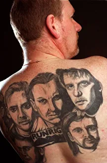 Andy Drummond who has the group Runrig tattoo-ed on his back. May 1997 Andy Drummond who has the group Runrig tattoo-ed on his back. May 1997