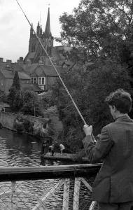 Angling. Young boy fishing in the River Leam at Leamington. 1st September 1970 Angling. Young boy fishing in the River Leam at Leamington. 1st September 1970