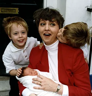 Anne Diamond TV Presenter with children Oliver and Jamie and their baby brother Anne Diamond TV Presenter with children Oliver and Jamie and their baby brother