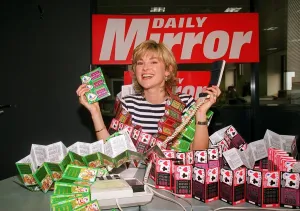 Anthea Turner TV Presenter mans the Daily Mirror National Lottery Scratchcards Anthea Turner TV Presenter mans the Daily Mirror National Lottery Scratchcards