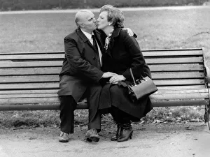 April Fools Day, On a park bench, Mrs Thatcher. hangs on to her handbag April Fools Day, On a park bench, Mrs Thatcher. hangs on to her handbag