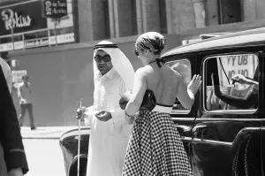 Arab man getting out from a taxi on Gloucester Road, South Kensington. June 1976 Arab man getting out from a taxi on Gloucester Road, South Kensington. June 1976