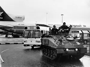The Army and Police giving security to an Air India Jumbo at Heathrow. June 1985 P004794 The Army and Police giving security to an Air India Jumbo at Heathrow. June 1985 P004794