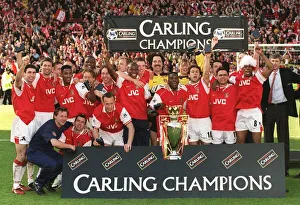 Arsenal players celebrating after beating Everton four nil at Highbury to win the Carling Arsenal players celebrating after beating Everton four nil at Highbury to win the Carling