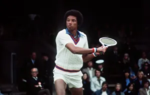 Arthur Ashe competing in the 1975 Wimbledon Tennis Championship Arthur Ashe competing in the 1975 Wimbledon Tennis Championship