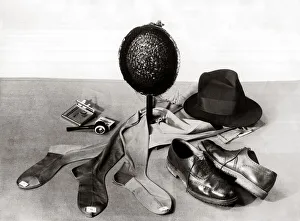 Assortment of various items of clothing including hats shoes socks Assortment of various items of clothing including hats shoes socks