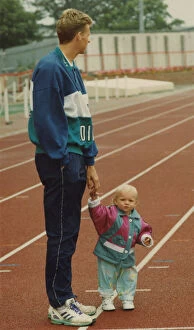 Images Dated 15th August 1990: Athlete Steve Cram Steve Cram with his daughter Josie pictured on the running