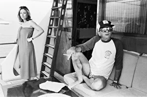 Author Harold Robbins takes a day off from writing his new novel " Author Harold Robbins takes a day off from writing his new novel "