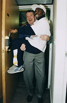 Baby Jake Matlala boxer being carried througth door by fight promoter Tommy Gilmour Baby Jake Matlala boxer being carried througth door by fight promoter Tommy Gilmour