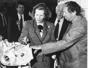 Baronnes Margaret Thatcher accompanied by Patrick Nicholls (left Baronnes Margaret Thatcher accompanied by Patrick Nicholls (left