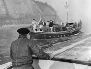 The Barry Dock lifeboat searches for the missing crew members of a tug The Barry Dock lifeboat searches for the missing crew members of a tug