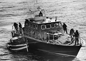 Barry lifeboat rescue four men from a cabin cruiser. After they brought the men to Barry lifeboat rescue four men from a cabin cruiser. After they brought the men to