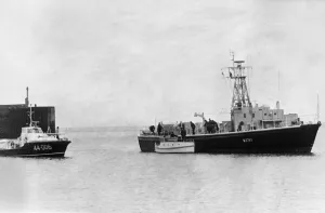 The Barry lifeboat and the Royal Navy Auxiliary ship Odiman escorts the small craft The Barry lifeboat and the Royal Navy Auxiliary ship Odiman escorts the small craft