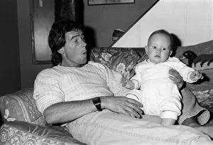 Barry Sheene with baby daughter Sidonie at home, May 1985 Barry Sheene with baby daughter Sidonie at home, May 1985